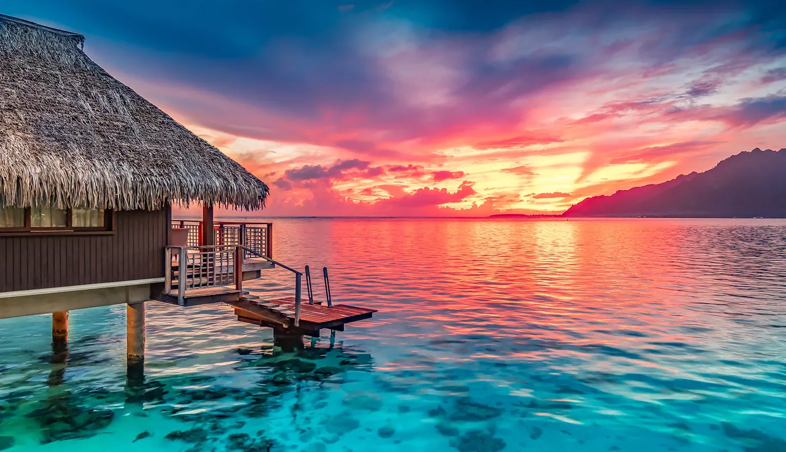 Moorea is where the pace changes—green peaks, blue silence, and time to breathe