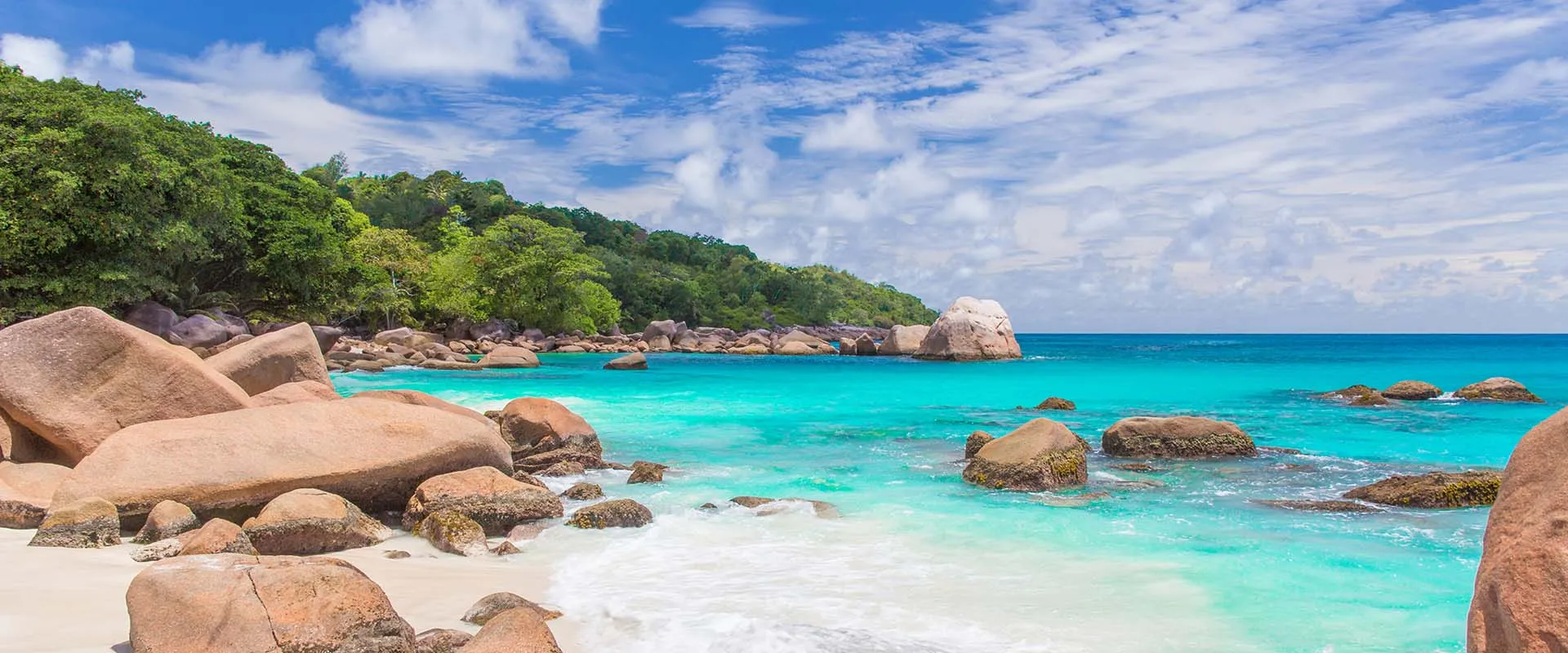 From jungle greens to beachside gold—Praslin at its finest