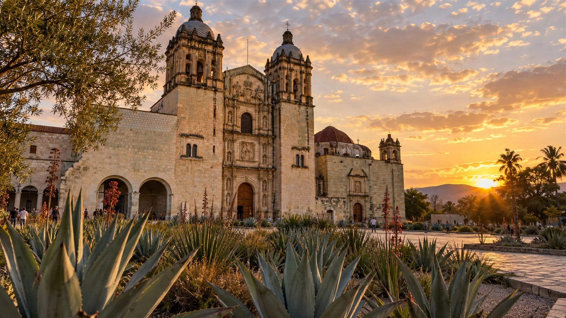 Oaxaca luxury travel scene with the baroque facade of Santo Domingo church and agave garden at golden hour, editorial travel photography
